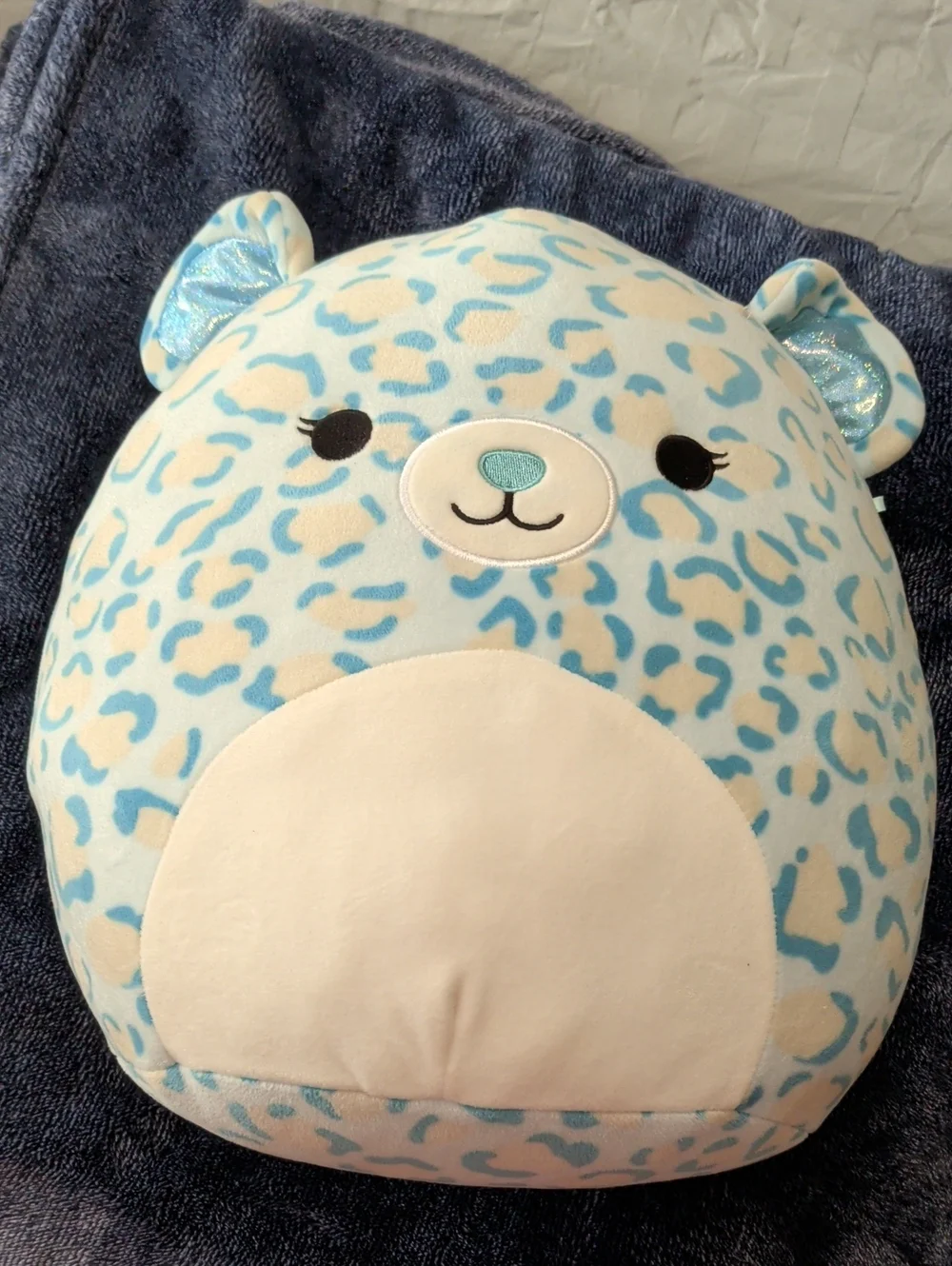 Squishmallows Blue and Cream Leopard Print Bear Pillow